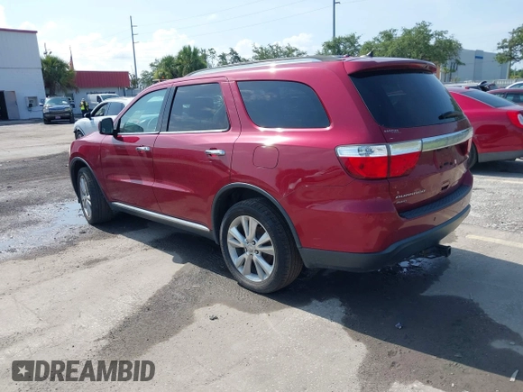2013 Dodge Durango Crew z VIN 1C4RDJDG6DC672934, wystawiony jako IAAI lot #42542073 z przebiegiem 181 812 mil mil oraz . Historia ofert i sprzedaży dostępna na DreamBid. Obrazek 3.