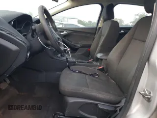 2017 Ford Focus SE with VIN 1FADP3F28HL315779, listed as a Copart auction lot 82608154 with 143,902 mi miles and Salvage title. Bid and sale history available at DreamBid. Image 7.