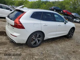 2019 Volvo XC60 R-Design z VIN LYVA22RMXKB234121, wystawiony jako Copart lot #57457405 z przebiegiem 93 792 mil mil oraz Szkoda całkowita • Salvage title. Historia ofert i sprzedaży dostępna na DreamBid. Obrazek 3.