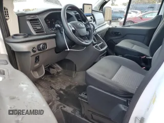 2021 Ford Transit Cargo with VIN 1FTBR1CG7MKA88875, listed as a Copart auction lot 84705324 with 23,654 mi miles and Salvage Title. Bid and sale history available at DreamBid. Image 8.