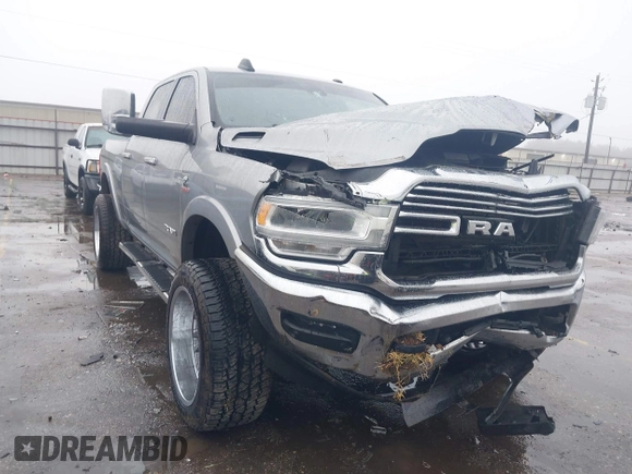 2021 Ram 2500 Laramie z VIN 3C6UR5FL7MG606281, wystawiony jako IAAI lot #41453570 z przebiegiem 73 755 mil mil oraz . Historia ofert i sprzedaży dostępna na DreamBid. Obrazek 1.