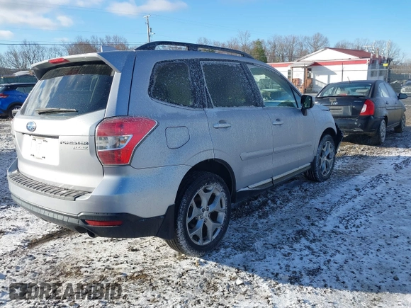 2016 Subaru Forester Touring z VIN JF2SJAXC4GH536085, wystawiony jako IAAI lot #41838081 z przebiegiem 155 930 mil mil oraz . Historia ofert i sprzedaży dostępna na DreamBid. Obrazek 4.