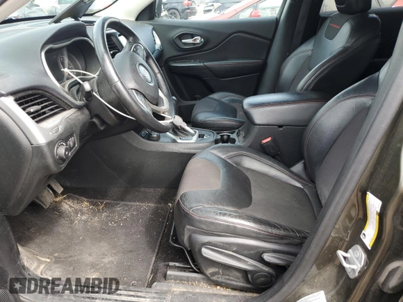 2015 Jeep Cherokee Trailhawk with VIN 1C4PJMBSXFW545534, listed as a Copart auction lot 62236885 with 148,448 mi miles and Clean title. Bid and sale history available at DreamBid. Image 7.