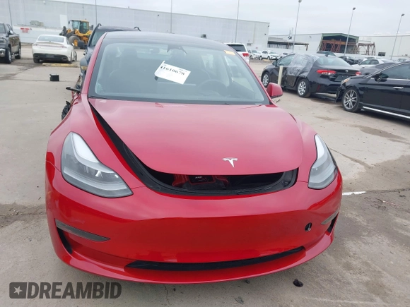 2023 Tesla Model 3 Long Range with VIN 5YJ3E1EB6PF388801, listed as a IAAI auction lot 41610678 with 20,144 mi miles and . Bid and sale history available at DreamBid. Image 13.