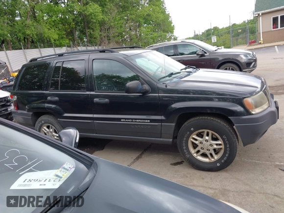 2004 Jeep Grand Cherokee Laredo with VIN 1J8GW48S94C357443, listed as a IAAI auction lot 42309958 with 176,738 mi miles and . Bid and sale history available at DreamBid. Image 13.