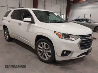 2021 Chevrolet Traverse Premier z VIN 1GNEVKKW7MJ218772, wystawiony jako IAAI lot #42306743 z przebiegiem 106 898 mil mil oraz . Historia ofert i sprzedaży dostępna na DreamBid. Obrazek 1.
