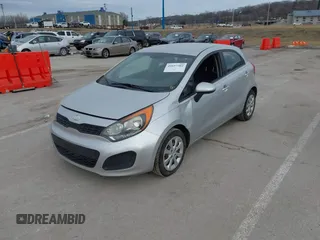 2013 Kia Rio LX with VIN KNADM5A30D6226681, listed as a IAAI auction lot 41657362 with 127,569 mi miles. Bid and sale history available at carsss.com. Image 2.