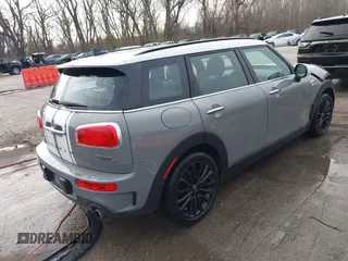 2017 MINI Clubman Cooper S with VIN WMWLU5C59H2E83705, listed as a IAAI auction lot 41853702 with 135,905 mi miles. Bid and sale history available at carsss.com. Image 4.