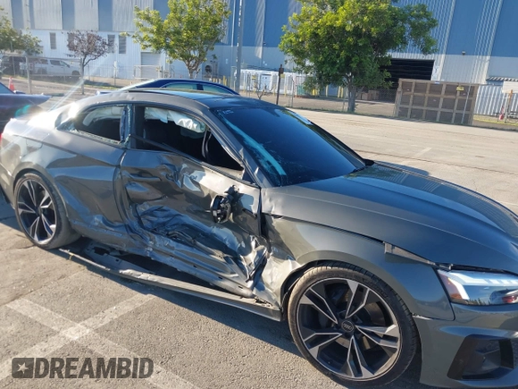 2023 Audi S5 Premium Plus with VIN WAUP4AF58PA001748, listed as a IAAI auction lot 41194878 with 33,877 mi miles and . Bid and sale history available at DreamBid. Image 6.
