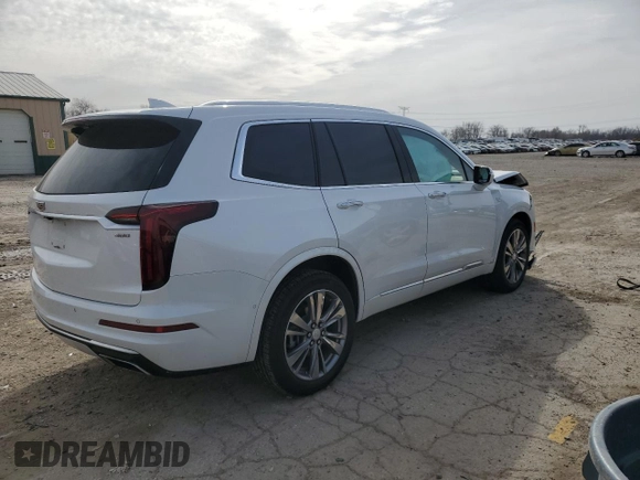 2022 Cadillac XT6 Premium Luxury with VIN 1GYKPFRS1NZ149557, listed as a Copart auction lot 49612165 with 31,425 mi miles and Salvage Title. Bid and sale history available at carsss.com. Image 3.