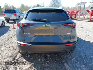 2023 Mazda CX-30 2.5 S Carbon Edition with VIN 3MVDMBCM5PM528946, listed as a IAAI auction lot 41882936 with 62,815 mi miles. Bid and sale history available at carsss.com. Image 16.