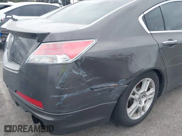 2009 Acura TL Technology z VIN 19UUA86519A014157, wystawiony jako IAAI lot #42058423 z przebiegiem 201 403 mil mil oraz . Historia ofert i sprzedaży dostępna na DreamBid. Obrazek 12.