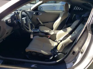 2004 Nissan 350Z Touring with VIN JN1AZ34E64T060440, listed as a Copart auction lot 79082914 with 178,742 mi miles and Salvage Title. Bid and sale history available at carsss.com. Image 7.