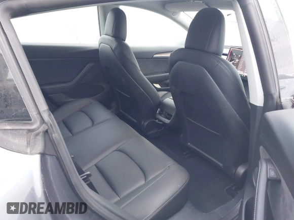 2023 Tesla Model 3 Long Range with VIN 5YJ3E1EB3PF389517, listed as a IAAI auction lot 41484978 with 13,411 mi miles and . Bid and sale history available at DreamBid. Image 8.