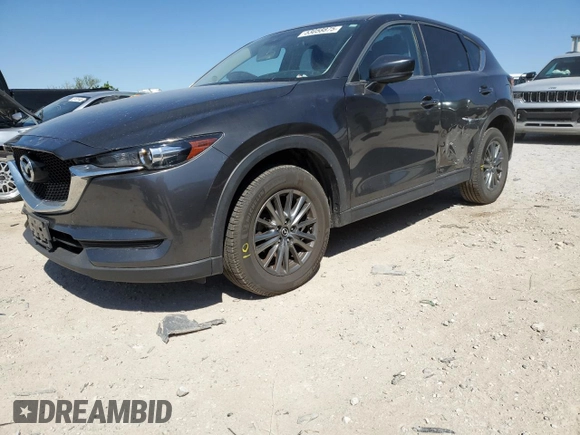 2017 Mazda CX-5 Touring with VIN JM3KFACL1H0100436, listed as a Copart auction lot 53058875 with 77,205 mi miles and Salvage Title. Bid and sale history available at DreamBid. Image 1.