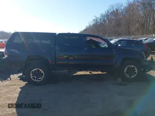 2011 Toyota Tacoma with VIN 3TMLU4EN4BM058738, listed as a IAAI auction lot 41646897 with 117,817 mi miles and . Bid and sale history available at DreamBid. Image 13.