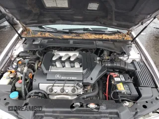 1997 Acura CL Premium z VIN 19UYA2257VL010732, wystawiony jako Copart lot #84667764 z przebiegiem 151 580 mil mil oraz Szkoda całkowita • Salvage title. Historia ofert i sprzedaży dostępna na DreamBid. Obrazek 11.