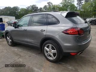 2014 Porsche Cayenne with VIN WP1AA2A22ELA08652, listed as a Copart auction lot 52549315 with 88,274 mi miles and Salvage Title. Bid and sale history available at DreamBid. Image 2.