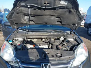 2010 Honda CR-V EX with VIN 5J6RE4H52AL039991, listed as a IAAI auction lot 41828104 with 131,013 mi miles. Bid and sale history available at carsss.com. Image 10.