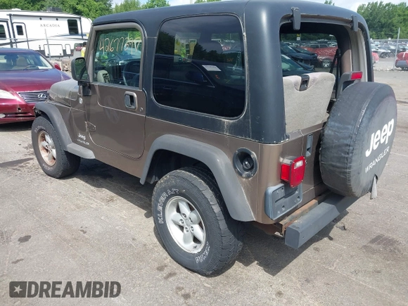 2005 Jeep Wrangler Sport with VIN 1J4FA49SX5P317120, listed as a IAAI auction lot 42677397 with 71,403 mi miles and . Bid and sale history available at DreamBid. Image 3.