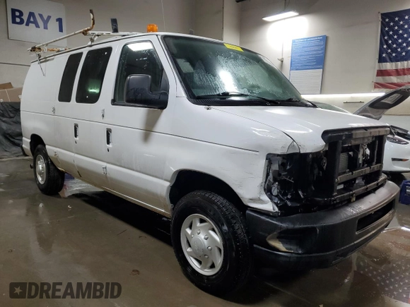 2011 Ford Econoline Cargo Commercial with VIN 1FTNE2EL6BDA70944, listed as a Copart auction lot 82169554 with 181,882 mi miles and Salvage title. Bid and sale history available at DreamBid. Image 4.
