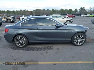 2015 BMW 2 Series 228i with VIN WBA1F5C59FV257447, listed as a IAAI auction lot 41706206 with 119,086 mi miles. Bid and sale history available at carsss.com. Image 14.