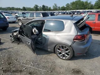 2013 Volkswagen GTI with VIN WVWED7AJ7DW082628, listed as a Copart auction lot 67630714 with 0 mi miles and Salvage Title. Bid and sale history available at carsss.com. Image 2.