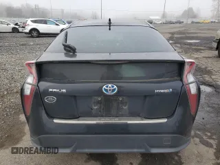 2017 Toyota Prius Two z VIN JTDKARFU3H3041401, wystawiony jako Copart lot #88738245 z przebiegiem 79 152 mil mil oraz Szkody całkowita. Historia ofert i sprzedaży dostępna na DreamBid. Obrazek 6.