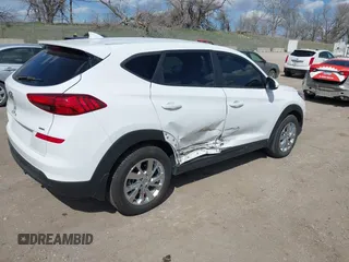 2019 Hyundai Tucson SE with VIN KM8J2CA43KU870933, listed as a IAAI auction lot 41972884 with 53,029 mi miles. Bid and sale history available at carsss.com. Image 4.