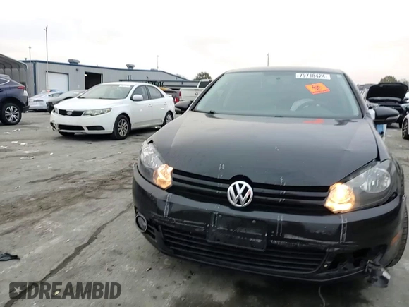 2014 Volkswagen Golf TDI w/Sunroof & Nav z VIN WVWDM7AJ8EW003755, wystawiony jako Copart lot #79718424 z przebiegiem 143 324 mil mil oraz Szkoda całkowita • Salvage title. Historia ofert i sprzedaży dostępna na DreamBid. Obrazek 10.