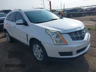 2011 Cadillac SRX Luxury Collection z VIN 3GYFNAEY0BS560204, wystawiony jako IAAI lot #42365902 z przebiegiem 194 688 mil mil oraz . Historia ofert i sprzedaży dostępna na DreamBid. Obrazek 1.
