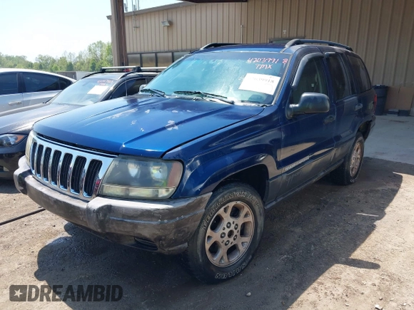 2003 Jeep Grand Cherokee Laredo with VIN 1J4GX48S83C548090, listed as a IAAI auction lot 42039918 with 243,209 mi miles. Bid and sale history available at carsss.com. Image 2.