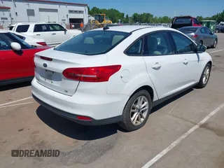 2017 Ford Focus SE with VIN 1FADP3F29HL234323, listed as a IAAI auction lot 42143821 with 138,860 mi miles. Bid and sale history available at carsss.com. Image 4.