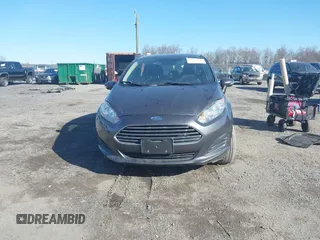 2015 Ford Fiesta SE z VIN 3FADP4BJ5FM219915, wystawiony jako IAAI lot #41725718 z przebiegiem 153 136 mil mil oraz . Historia ofert i sprzedaży dostępna na DreamBid. Obrazek 12.