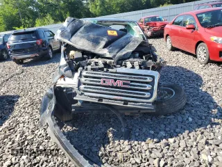 2015 GMC Canyon 2WD SLE z VIN 1GTH5BEA5F1190091, wystawiony jako Copart lot #59672204 z przebiegiem Nie podano mil oraz Szkoda całkowita • Salvage title. Historia ofert i sprzedaży dostępna na DreamBid. Obrazek 5.