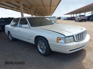 1999 Cadillac DeVille z VIN 1G6KD54YXXU794294, wystawiony jako IAAI lot #42141931 z przebiegiem 161 408 mil mil oraz . Historia ofert i sprzedaży dostępna na DreamBid. Obrazek 1.