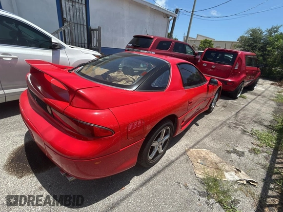 1999 Mitsubishi 3000GT GT z VIN JA3AM84J3XY001387, wystawiony jako Copart lot #61198735 z przebiegiem 137 514 mil mil oraz Czysty tytuł • Clean title. Historia ofert i sprzedaży dostępna na DreamBid. Obrazek 4.