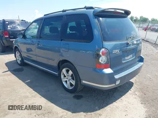 2004 Mazda MPV ES with VIN JM3LW28J640531561, listed as a IAAI auction lot 42223681 with 213,144 mi miles and . Bid and sale history available at DreamBid. Image 3.
