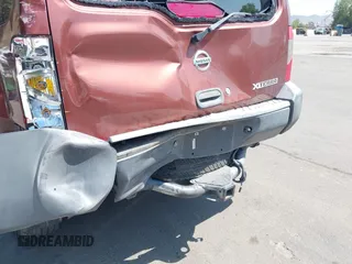 2002 Nissan Xterra XE z VIN 5N1ED28T22C503143, wystawiony jako IAAI lot #42215012 z przebiegiem 236 895 mil mil oraz . Historia ofert i sprzedaży dostępna na DreamBid. Obrazek 13.