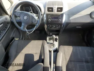 2010 Suzuki SX4 with VIN JS2YB5A24A6300249, listed as a Copart auction lot 71565394 with 291,886 mi miles and Salvage Title. Bid and sale history available at DreamBid. Image 8.