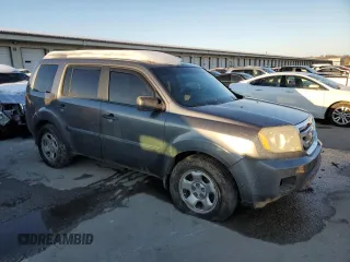 2011 Honda Pilot LX with VIN 5FNYF4H20BB068768, listed as a Copart auction lot 87152394 with 203,679 mi miles and Salvage Title. Bid and sale history available at DreamBid. Image 4.