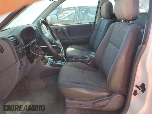 2001 Isuzu Rodeo z VIN 4S2CK57W614340766, wystawiony jako Copart lot #73891524 z przebiegiem 124 446 mil mil oraz Nie do naprawy. Historia ofert i sprzedaży dostępna na DreamBid. Obrazek 7.