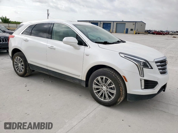 2017 Cadillac XT5 Luxury FWD with VIN 1GYKNBRS5HZ131517, listed as a Copart auction lot 60605595 with 130,522 mi miles and Clean title. Bid and sale history available at DreamBid. Image 4.