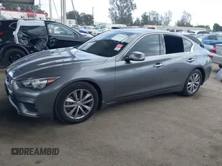 2021 Infiniti Q50 Pure with VIN JN1EV7AP3MM704464, listed as a IAAI auction lot 41915813 with 28,596 mi miles and . Bid and sale history available at DreamBid. Image 13.
