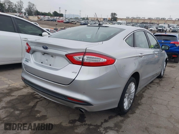 2016 Ford Fusion Energi SE Luxury with VIN 3FA6P0PU9GR357076, listed as a IAAI auction lot 42081615 with 174,234 mi miles. Bid and sale history available at carsss.com. Image 4.