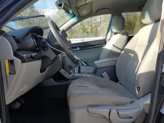 2012 Kia Sorento LX with VIN 5XYKT4A11CG251848, listed as a Copart auction lot 48015425 with 182,134 mi miles and Salvage Title. Bid and sale history available at DreamBid. Image 7.
