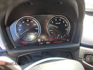 2021 BMW X1 sDrive28i z VIN WBXJG7C04M5U03124, wystawiony jako Copart lot #54447515 z przebiegiem 11 794 mil mil oraz Szkoda całkowita • Salvage title. Historia ofert i sprzedaży dostępna na DreamBid. Obrazek 9.