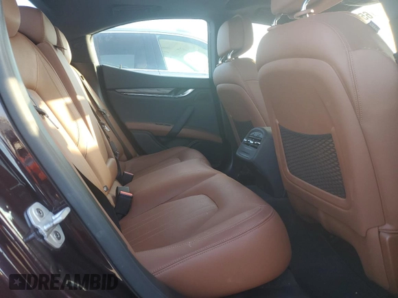 2018 Maserati Ghibli with VIN ZAM57XSA0J1286682, listed as a Copart auction lot 65457315 with 50,169 mi miles and Salvage title. Bid and sale history available at DreamBid. Image 10.