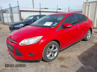 2013 Ford Focus SE with VIN 1FADP3F22DL262796, listed as a IAAI auction lot 42053634 with 72,500 mi miles and . Bid and sale history available at DreamBid. Image 2.