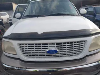 2000 Ford Expedition XLT with VIN 1FMEU1767YLB19633, listed as a IAAI auction lot 41594877 with 288,439 mi miles and . Bid and sale history available at DreamBid. Image 6.